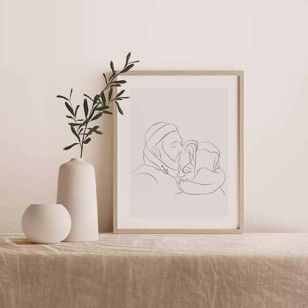 Dessin en Line Art d'un couple, placé dans un cadre sur une table à côté d'une plante