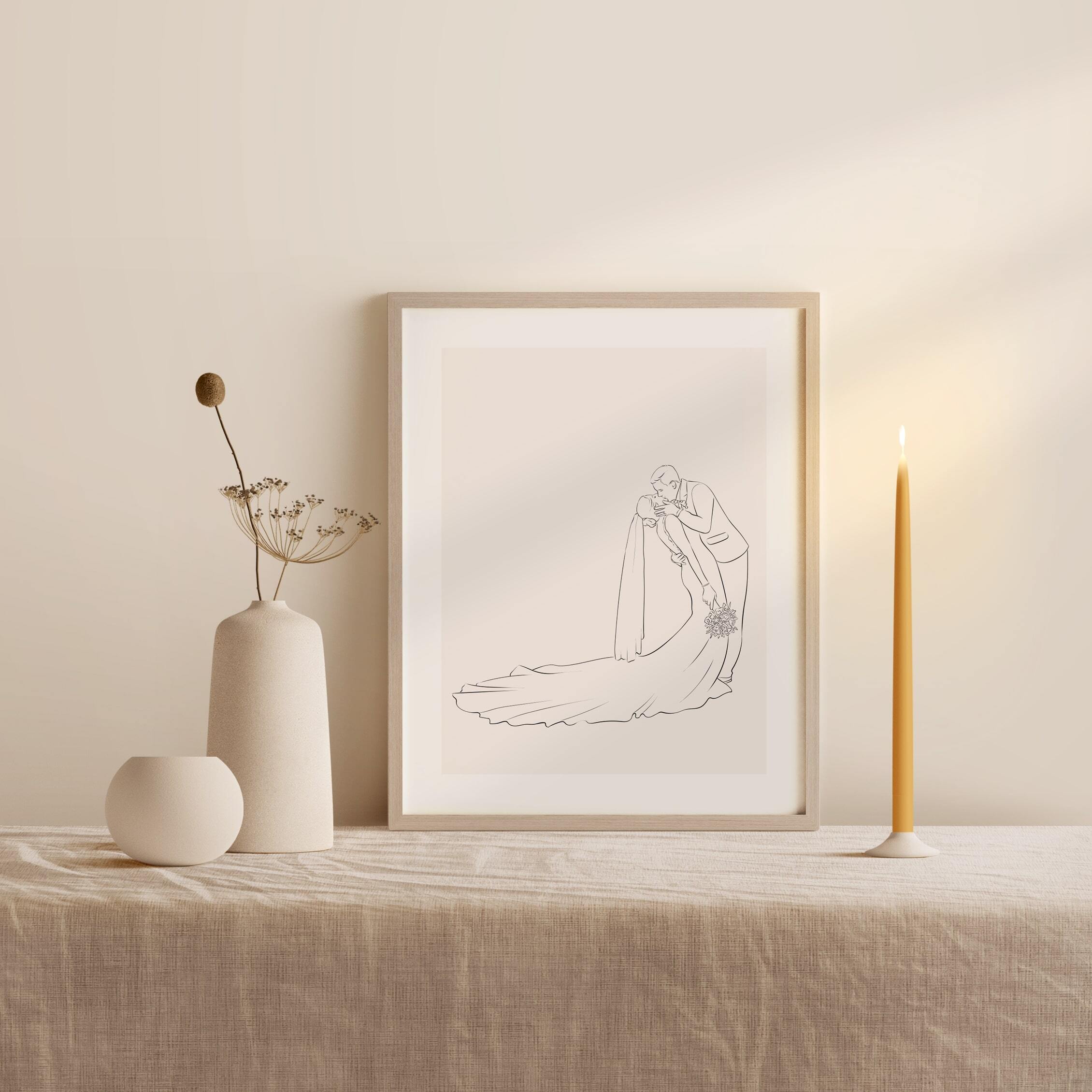 Photo de mariage d'un couple s'embrassant en profil, illustrée en Line Art